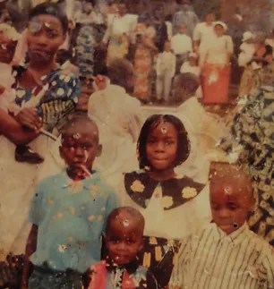 Old family photograph of a mother with five children